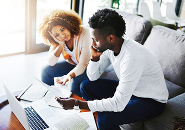 Young couple managing their finances